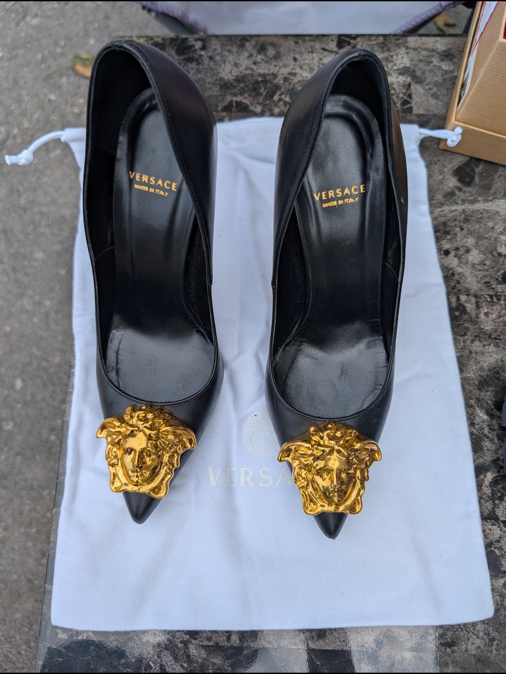 Versace Black Leather Pointed-Toe Pumps with Gold Medusa Accent